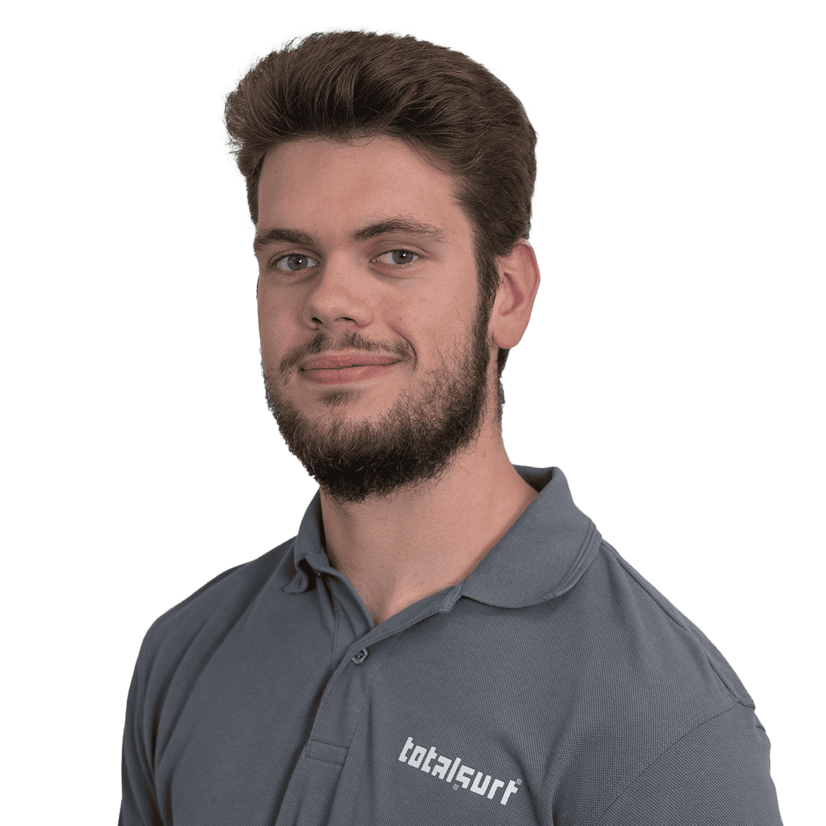Man with short brown hair and beard wearing a grey "totalsurf" polo shirt on a white background.