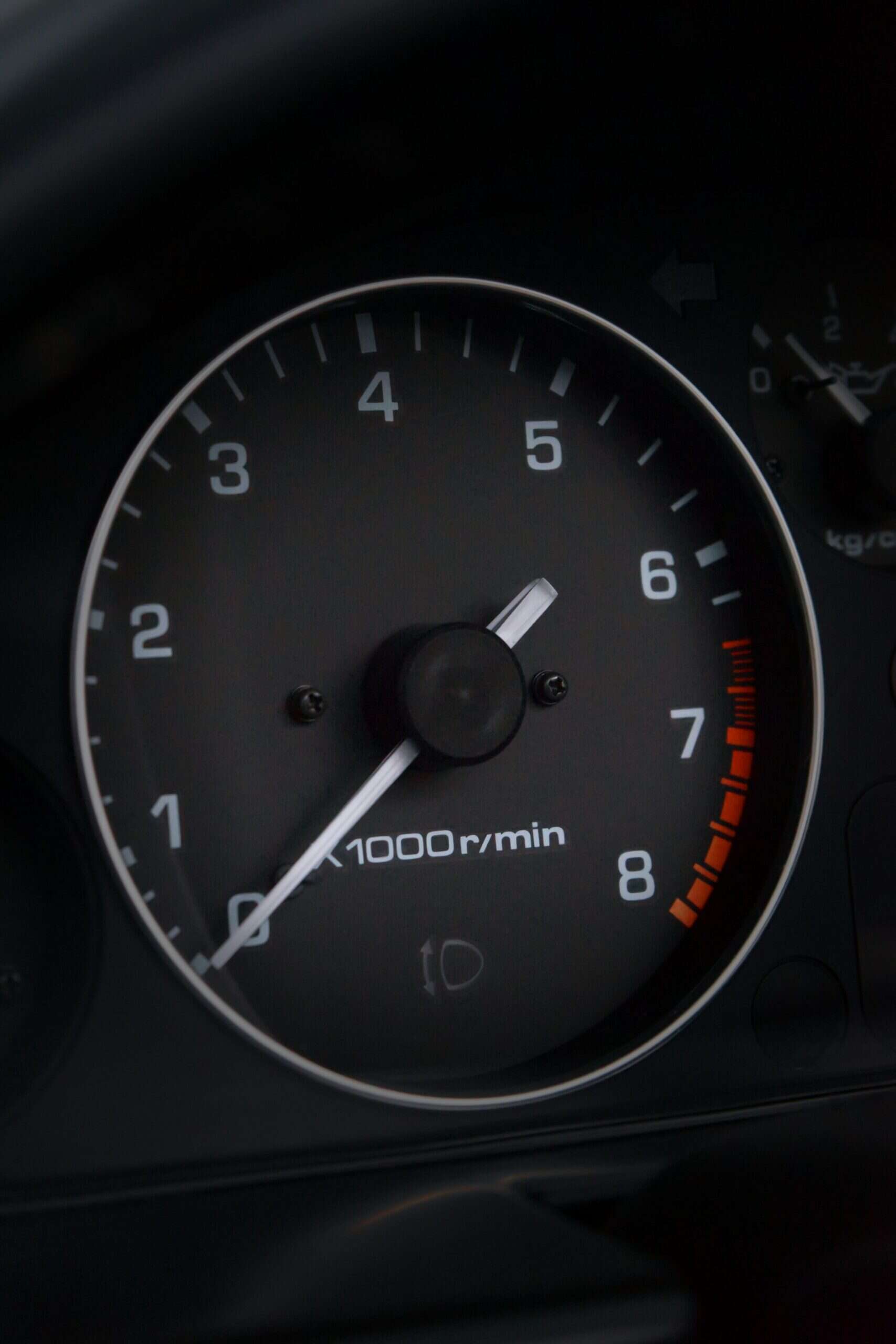 A car tachometer showing the engine running at around 5,800 revolutions per minute (RPM).